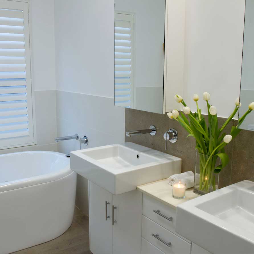 Bathroom in the Parkside Suite showing double vanities and spa