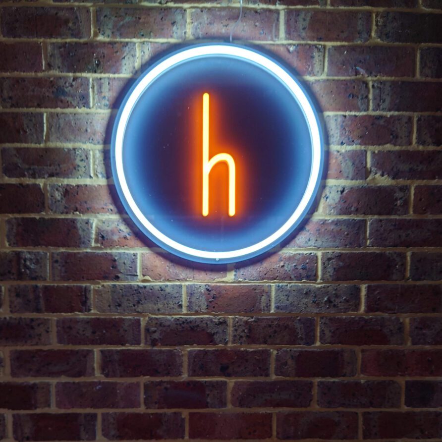 Haven on the Park exterior neon logo sign